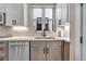 Well-lit kitchen with granite countertops, stainless steel appliances, and ample storage space at 3219 W 19Th Ave # 3, Denver, CO 80204