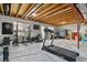 Unfinished basement offers potential for a home gym, with exposed ceiling at 2549 Loon Cir, Castle Rock, CO 80104