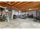 Spacious unfinished basement area with concrete flooring and exposed wood ceiling, ready for customization at 2549 Loon Cir, Castle Rock, CO 80104