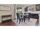 Cozy dining area featuring a view to the exterior through a sliding glass door and lots of natural light at 2549 Loon Cir, Castle Rock, CO 80104