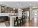 Modern kitchen featuring stainless steel appliances, granite countertops, and a spacious island with bar seating at 2549 Loon Cir, Castle Rock, CO 80104