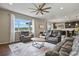 Sun-filled living room with scenic views, plush seating, and an open layout at 2549 Loon Cir, Castle Rock, CO 80104