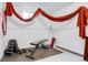 Basement gym with workout bench, free weights, and padded flooring, perfect for a home fitness routine at 15104 E Utah Pl, Aurora, CO 80012