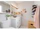 Bright bathroom featuring modern sink, fixtures, and tiled floor providing comfort at 15104 E Utah Pl, Aurora, CO 80012