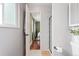 Stylish bathroom featuring a glass-enclosed shower and views to the main bedroom at 15104 E Utah Pl, Aurora, CO 80012