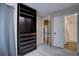 Bedroom with a large closet, and light-filled ensuite bath for comfort and convenience at 9288 Krashin Dr, Conifer, CO 80433