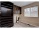 Spacious laundry room features a storage cabinet and washer/dryer hookups at 9288 Krashin Dr, Conifer, CO 80433