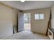 Storage room with an open door to the backyard at 9288 Krashin Dr, Conifer, CO 80433