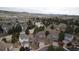 Scenic aerial view of the neighborhood with lush trees and beautiful homes at 2805 Masters Ln, Castle Rock, CO 80104