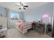 Cute bedroom features carpet floors, and a bright window at 2805 Masters Ln, Castle Rock, CO 80104
