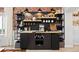 Custom coffee bar area with modern fixtures and ample storage space at 2805 Masters Ln, Castle Rock, CO 80104