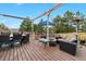 Spacious deck with dining and lounge areas, perfect for outdoor entertaining at 2805 Masters Ln, Castle Rock, CO 80104