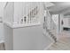 Bright hallway with a staircase and access to a mudroom area at 2805 Masters Ln, Castle Rock, CO 80104