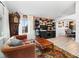 Cozy living room featuring a coffee bar, exposed brick and a unique decor at 2805 Masters Ln, Castle Rock, CO 80104