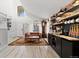 Bright living room featuring custom coffee bar and open concept design at 2805 Masters Ln, Castle Rock, CO 80104