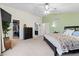 Spacious main bedroom features high ceilings, neutral carpet, ceiling fan and ensuite bathroom and walk-in closet at 2805 Masters Ln, Castle Rock, CO 80104