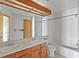 Bathroom featuring a double sink vanity, a bathtub and a shower at 12043 E Ford Cir, Aurora, CO 80012