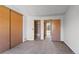 Spacious bedroom with carpeted floor, and closet at 12043 E Ford Cir, Aurora, CO 80012