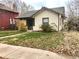 Charming home exterior with gray roof, light siding, and a well-maintained lawn at 3953 Vrain St, Denver, CO 80212