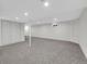 Finished basement with plush carpet and storage closet at 8694 E Eastman Ave, Denver, CO 80231