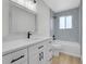 Bathroom with a vanity, a mirror and a shower at 8694 E Eastman Ave, Denver, CO 80231