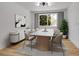 Cozy dining room with a marble table, six chairs, and natural light at 8694 E Eastman Ave, Denver, CO 80231