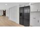 Modern kitchen featuring stainless steel refrigerator and updated fixtures at 8694 E Eastman Ave, Denver, CO 80231