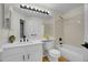 Well-lit bathroom featuring modern fixtures and a clean design at 1717 Tulip St, Longmont, CO 80501