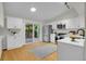 Modern kitchen featuring stainless steel appliances, and access to the deck at 1717 Tulip St, Longmont, CO 80501