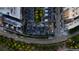 Overhead view of a dense residential area featuring modern architecture, tree-lined streets, and well-maintained landscaping at 1804 Little Raven St, Denver, CO 80202
