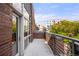 Private balcony with brick facade and city views at 1804 Little Raven St, Denver, CO 80202