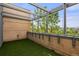 Covered balcony with artificial turf and city views at 1804 Little Raven St, Denver, CO 80202