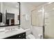 Clean bathroom with a walk-in shower and marble vanity at 1804 Little Raven St, Denver, CO 80202
