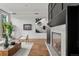 Modern fireplace with concrete surround in a living room at 1804 Little Raven St, Denver, CO 80202