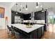 Modern kitchen with a large island and stainless steel appliances at 1804 Little Raven St, Denver, CO 80202