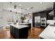 Modern kitchen with a large island and stainless steel appliances at 1804 Little Raven St, Denver, CO 80202