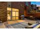 Outdoor patio with seating area, dining table, and grill at 1804 Little Raven St, Denver, CO 80202