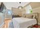 Cozy bedroom with soft lighting, plush bedding, and soothing color palette at 3779 Quitman St, Denver, CO 80212