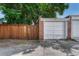 Garage exterior with a white door and brick accents at 3779 Quitman St, Denver, CO 80212