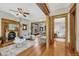 Cozy living room with hardwood floors, fireplace, and wood trim at 3779 Quitman St, Denver, CO 80212