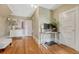 Home office with wood floors, a desk setup, and natural light at 3779 Quitman St, Denver, CO 80212