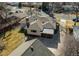 Overhead shot of the home with a large detached garage and patio at 2061 E Floyd Ave, Englewood, CO 80113