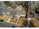 Aerial view showcases the home's layout, surrounding greenery, and neighborhood context at 2061 E Floyd Ave, Englewood, CO 80113