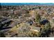 Neighborhood aerial view featuring tree-lined streets and mountain views at 2061 E Floyd Ave, Englewood, CO 80113