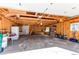 Spacious unfinished garage with ample storage space and natural light at 2061 E Floyd Ave, Englewood, CO 80113
