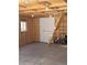 Spacious, unfinished garage providing potential for customization at 2061 E Floyd Ave, Englewood, CO 80113