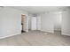 Spacious bedroom with soft carpet and multiple doorways at 2973 Oxley St, Strasburg, CO 80136