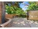 Brick backyard patio offers space for entertaining and gardening at 12408 E Ohio Ave, Aurora, CO 80012