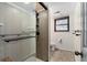 Modern bathroom featuring a glass shower, stylish fixtures, and contemporary design at 12408 E Ohio Ave, Aurora, CO 80012
