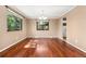 Formal dining area with hardwood floors and contemporary lighting fixture at 12408 E Ohio Ave, Aurora, CO 80012